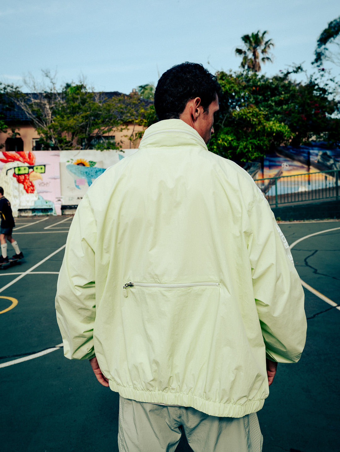 PACKABLE WINDBREAKER - Apple