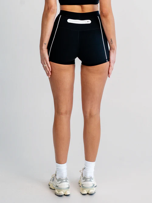 Back view of black 2.5" bike short on model