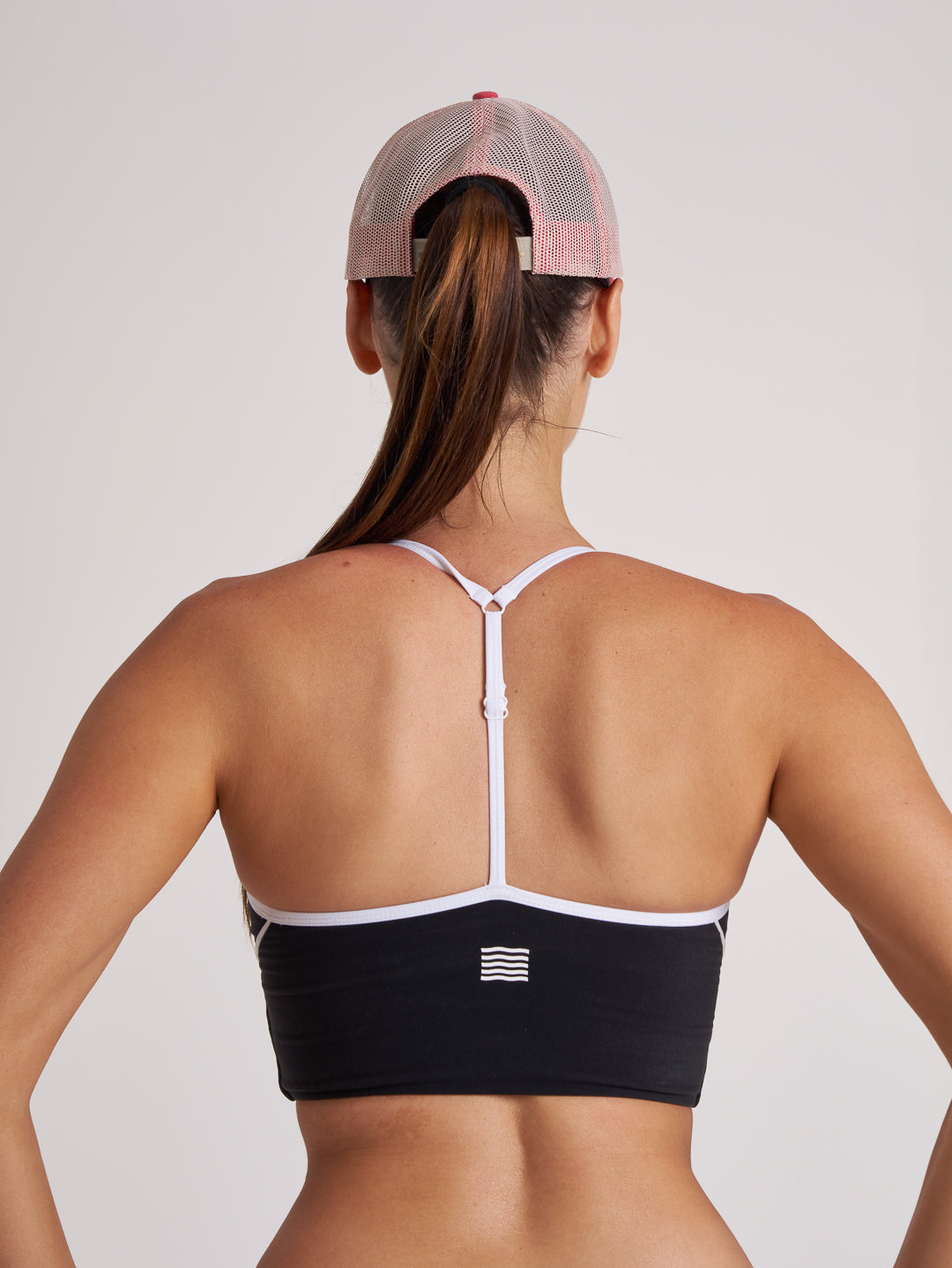 Back view of washed red and white cap