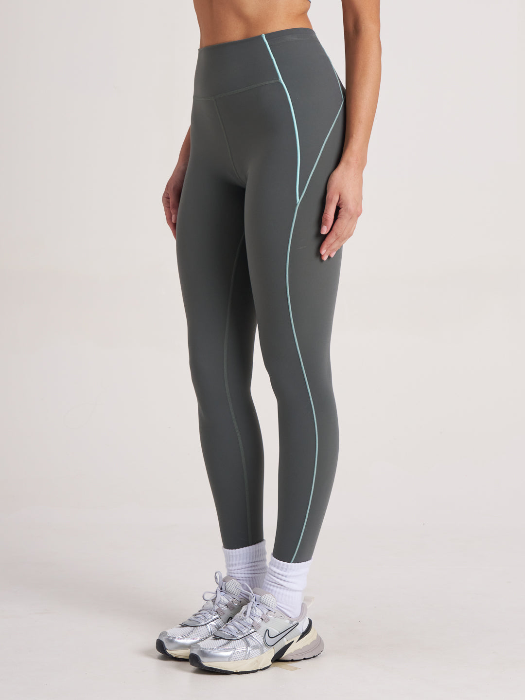 Side profile of asphalt grey leggings