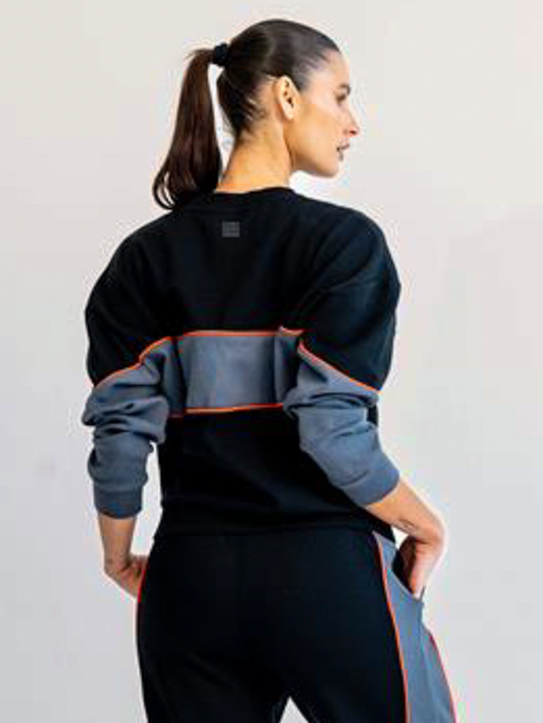 Back view of black and grey sweatshirt