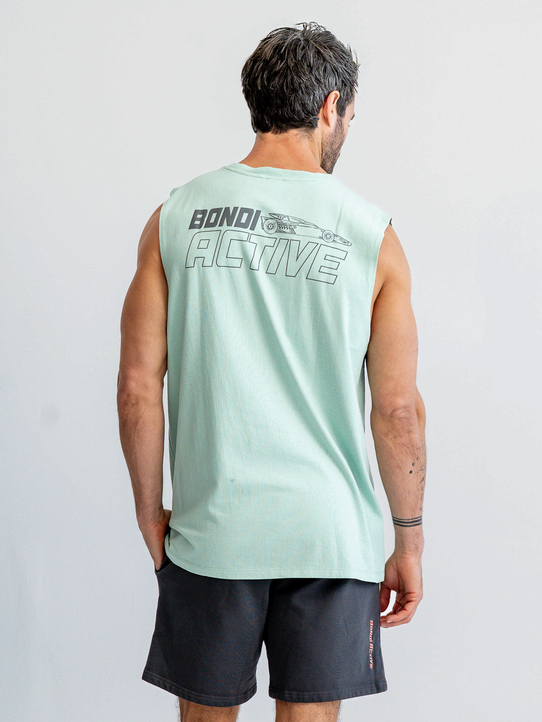 Back view of mint green and asphalt grey tank top
